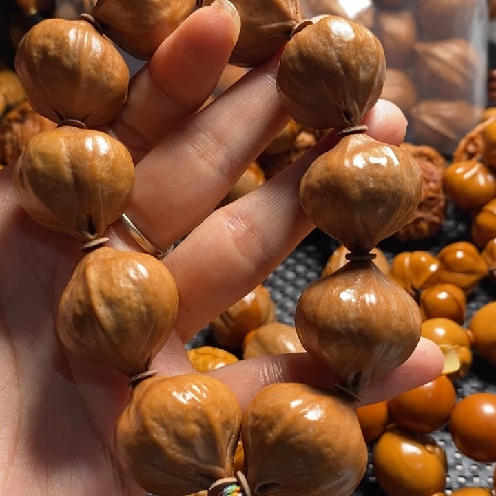 橄榄核吊坠街**达大铁素