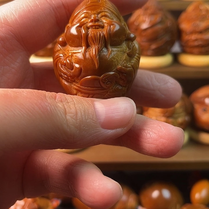 添***寿吊坠橄榄核手把件一对