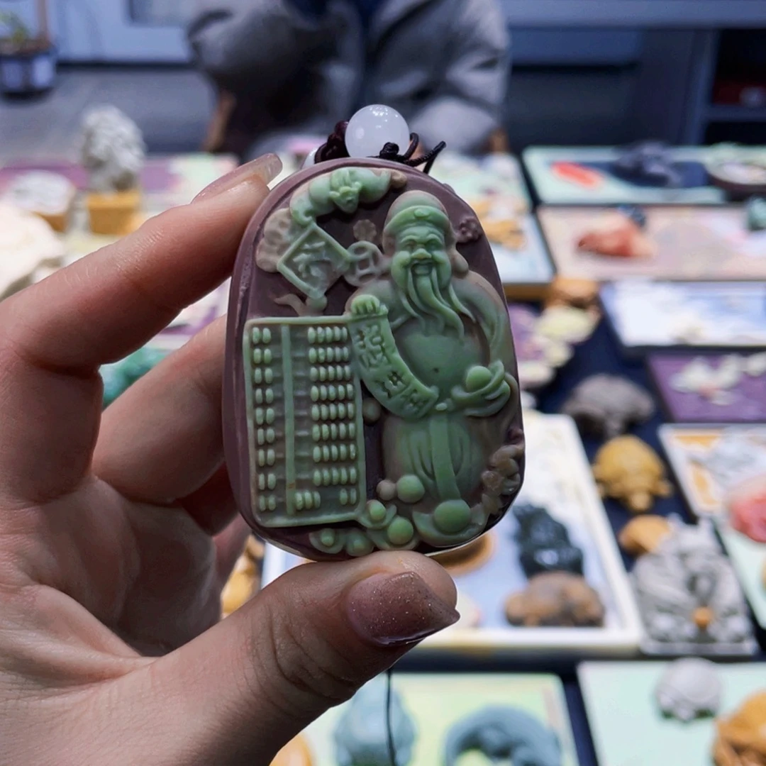 财神紫袍玉带石手把件