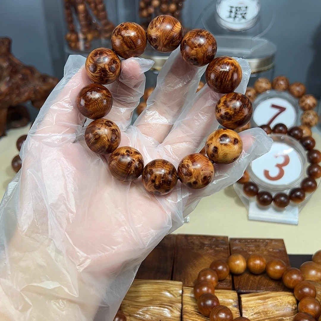 郭***师柏木（崖柏）2.0黑金瘤疤火焰瑕疵珠 不退不换