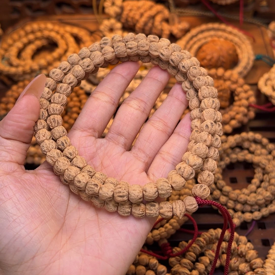 柏香籽/百香籽吊坠直切深坑鬼脸