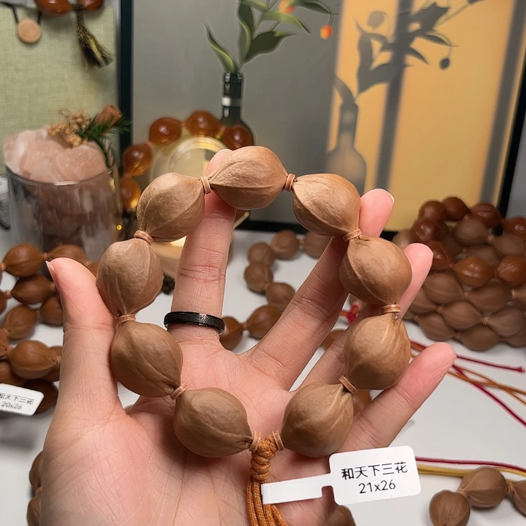 青***长橄榄核吊坠2126素串