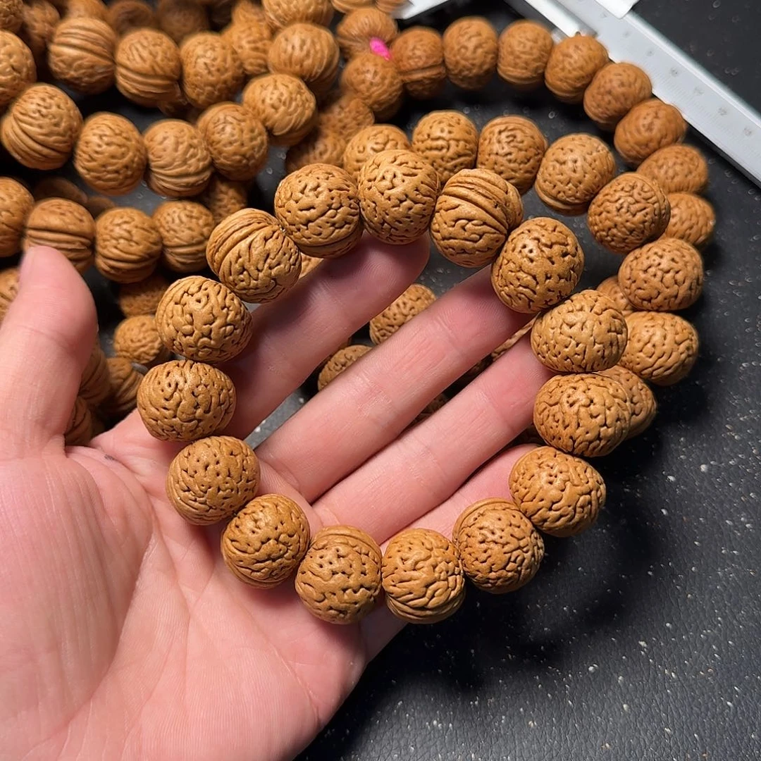 桃核吊坠苹果园手串