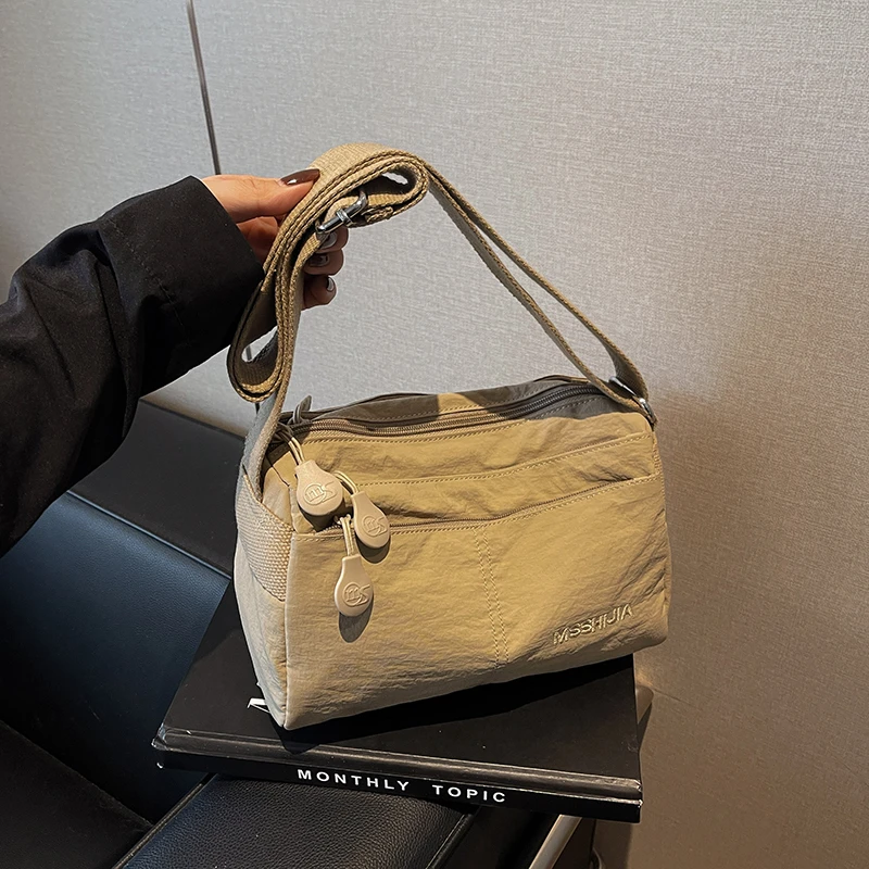 2025时尚新款轻便百搭小众耐磨斜跨韩式单肩包多层横式简约小包包