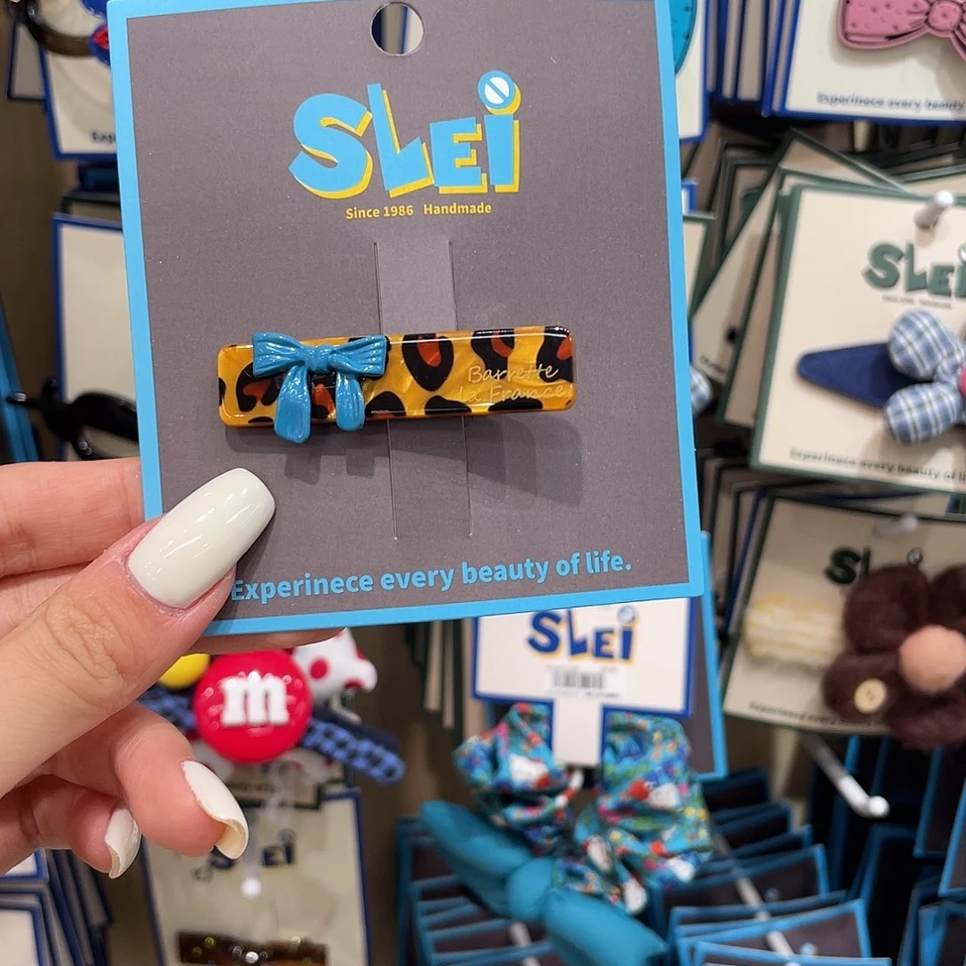 布艺非金属豹纹蓝蝴蝶结发夹