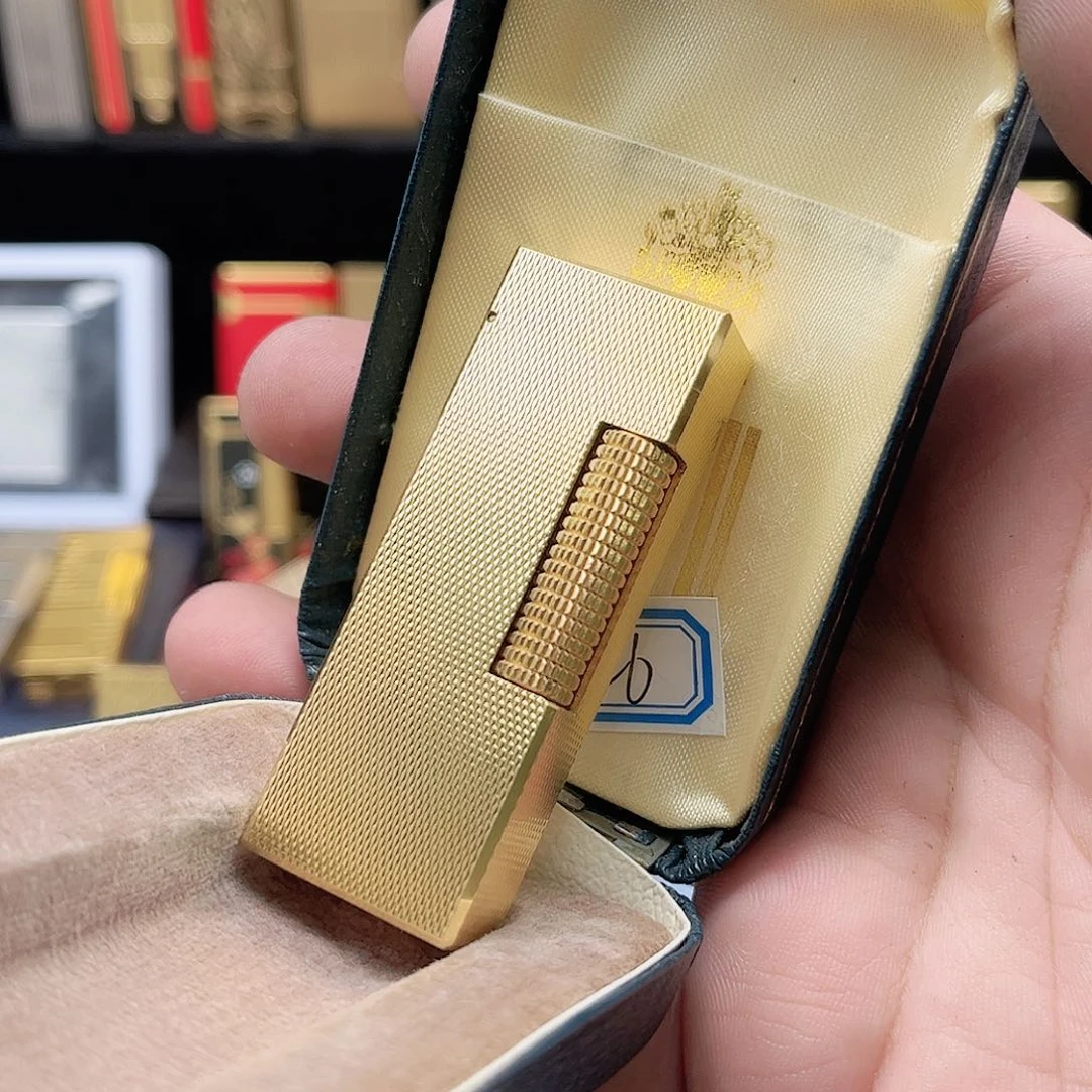 黄***天登四代金色麦粒打火机