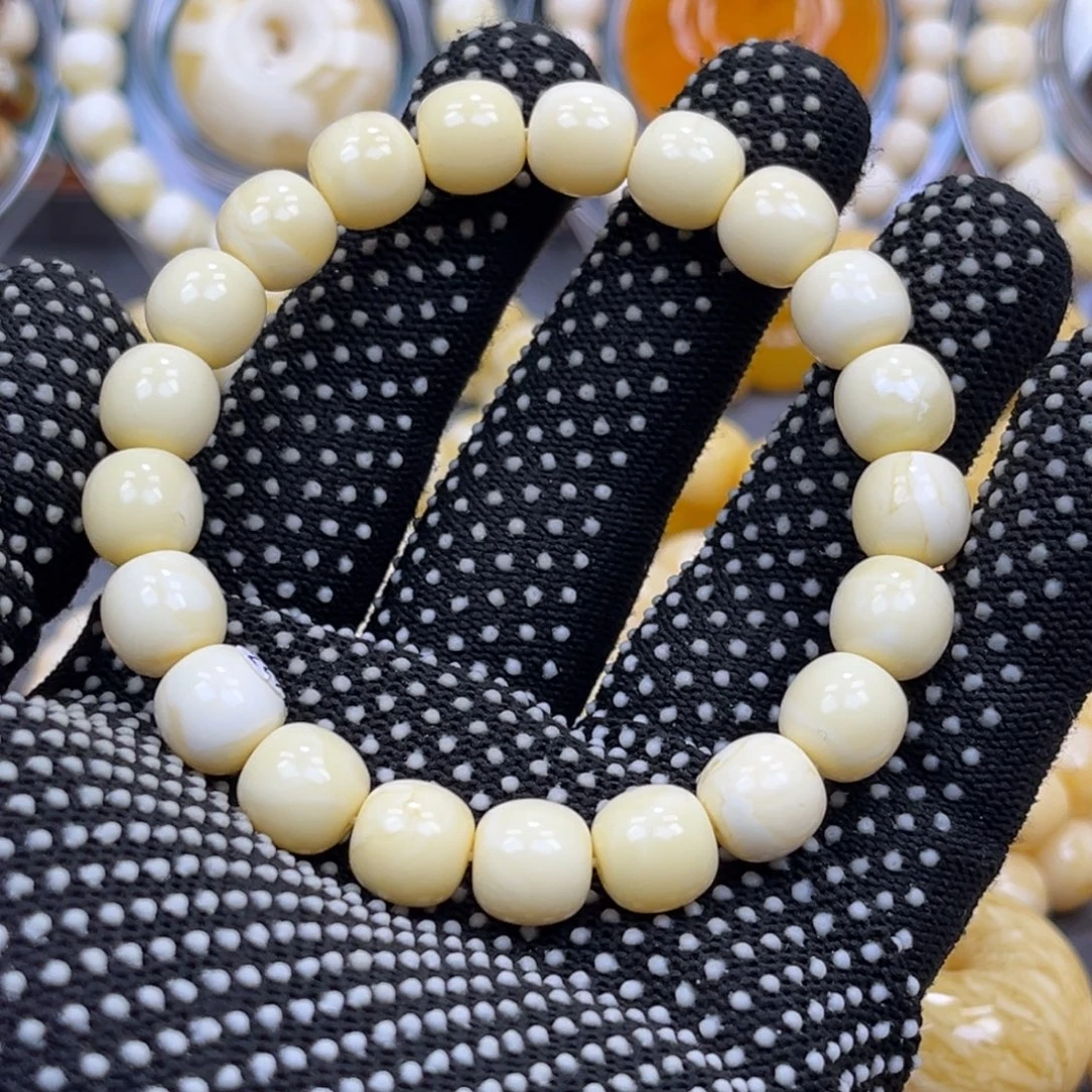 琥珀未镶嵌手串同料焦皮浓白老邢手串10.6mm