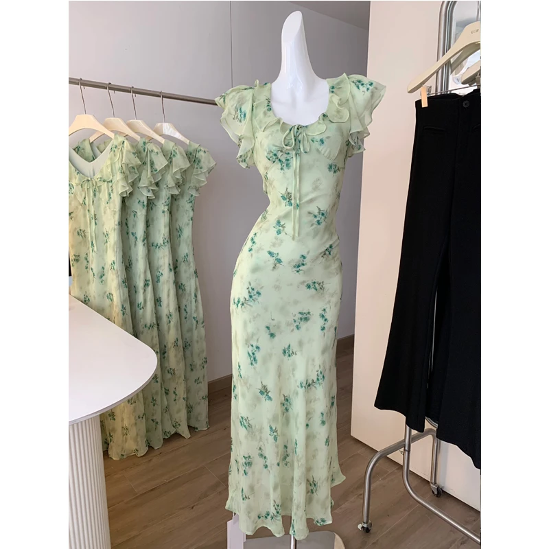 十三行新款法式绿色碎花吊带连衣裙女夏季新款设计感小众收腰显瘦