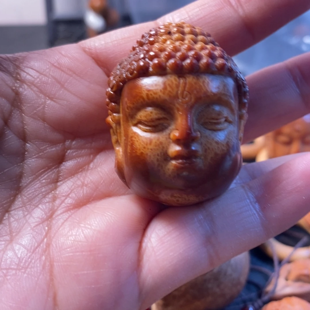 橄榄核吊坠》****《特价佛头，不退不换