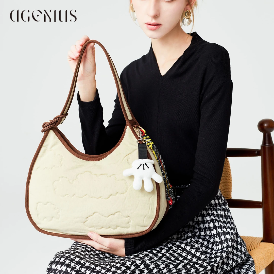 DGENIUS原创托特女包2025新款腋下包编织月牙包大容量通勤饺子包