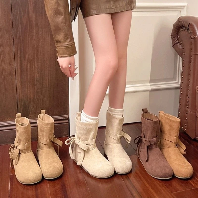 {啊泉}瘦瘦靴复古蝴蝶结马丁靴女2025秋冬季新款时尚百搭平底