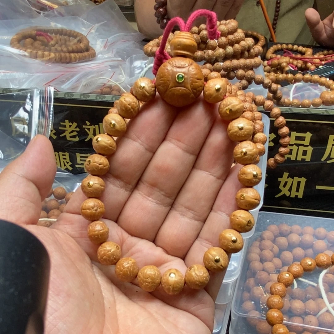 凤眼菩提吊坠10.5实心金钉手串
