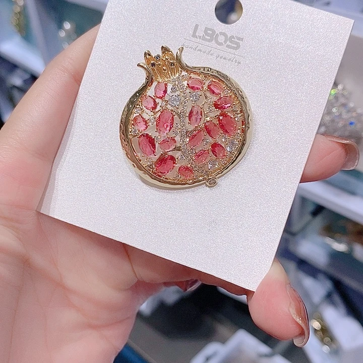 锆石铜合金石榴胸针