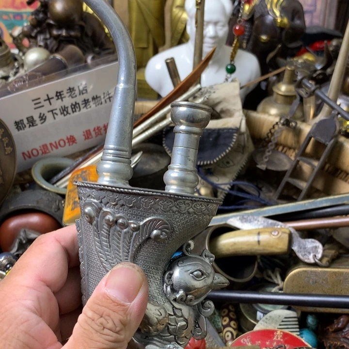 梅***生一物一拍水烟袋一个