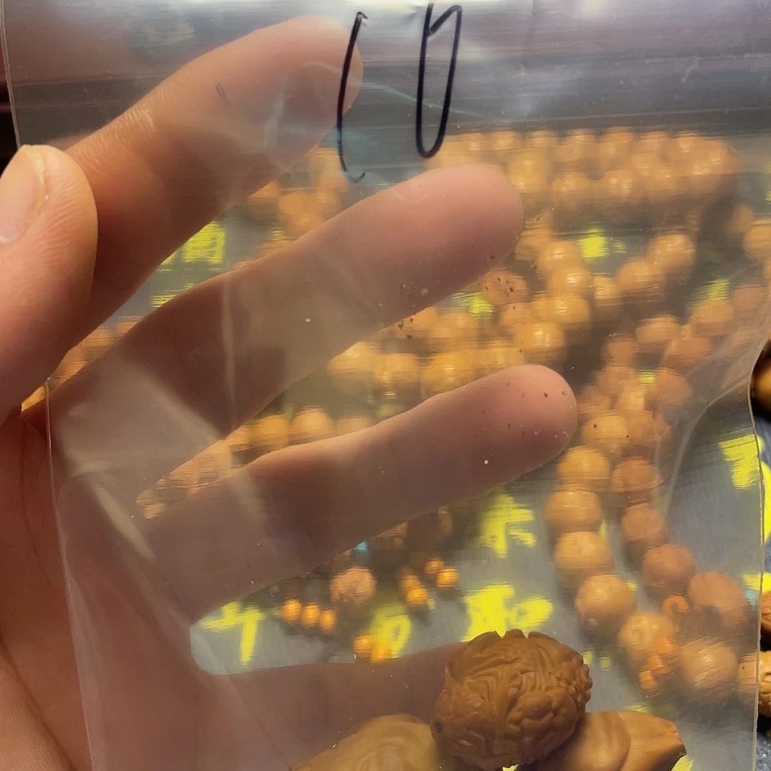 可*?橄榄核雕刻瑕疵单籽