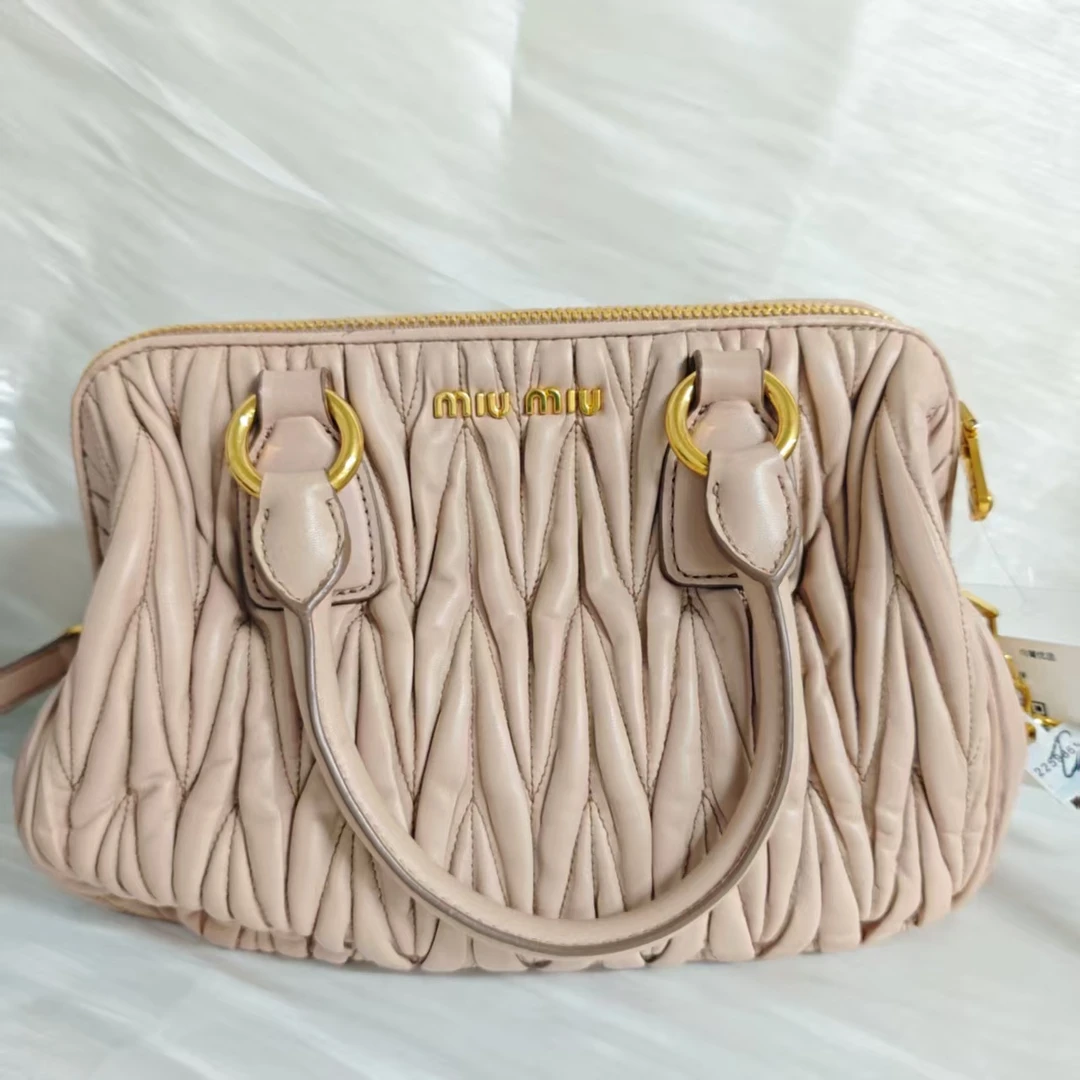 95新 MIU MIU/缪缪 缪缪时尚女士手拿包5054 3472