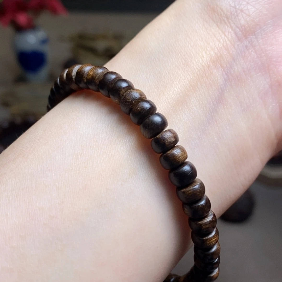 沉香手串越南芽庄紫琪瘤疤算盘珠0.6