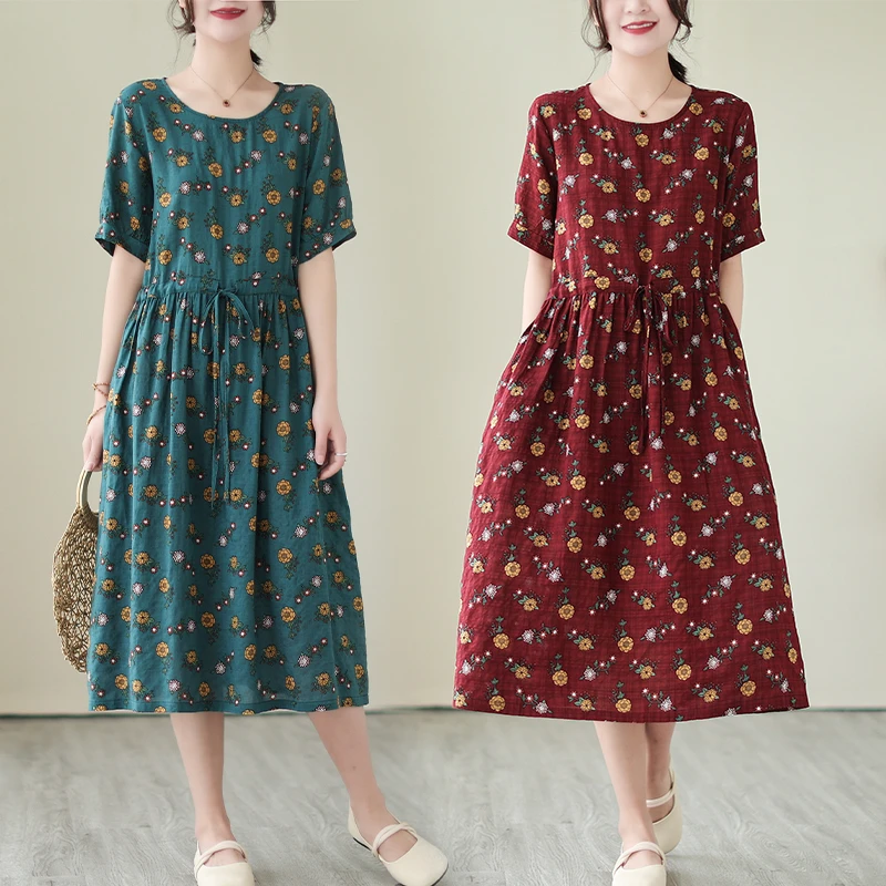 棉麻碎花连衣裙2025夏季新款圆领宽松抽绳显瘦短袖A字裙