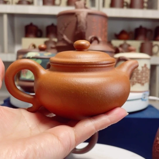 紫砂茶杯木*圣降波仿古壶