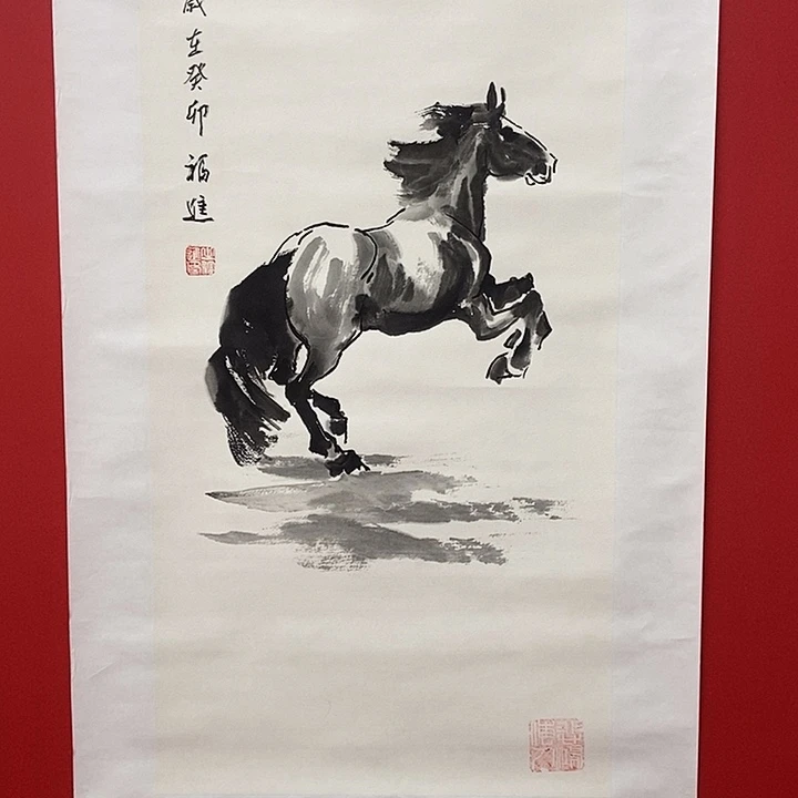 国画牛福进飞奔马
