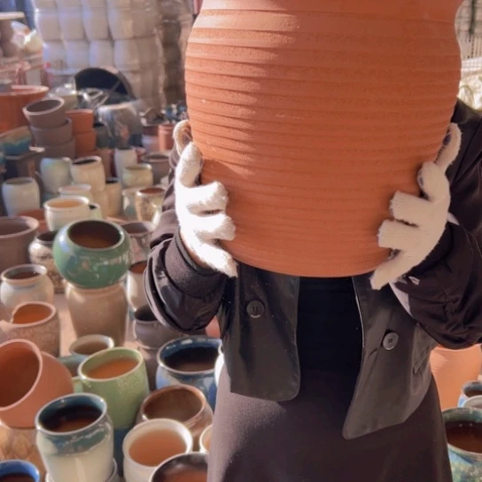 紫砂花盆高高26口25。