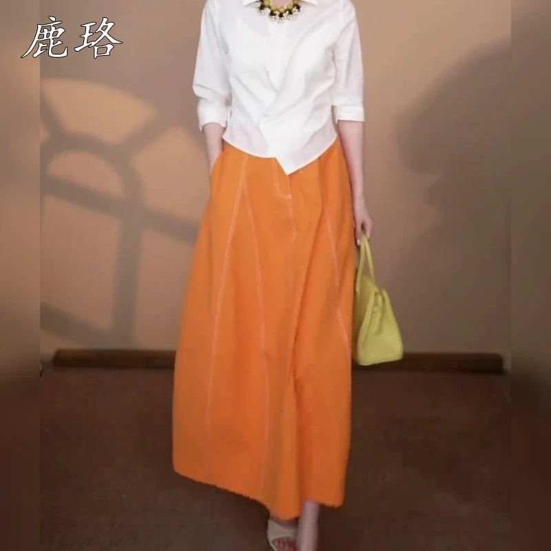 设计感气质减龄橙色半身裙女2025夏季新款时尚高级感高腰显瘦长裙