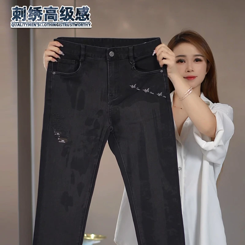 刺绣水洗牛仔裤男生秋冬季新款欧货修身长裤子男装时尚设计感柔软