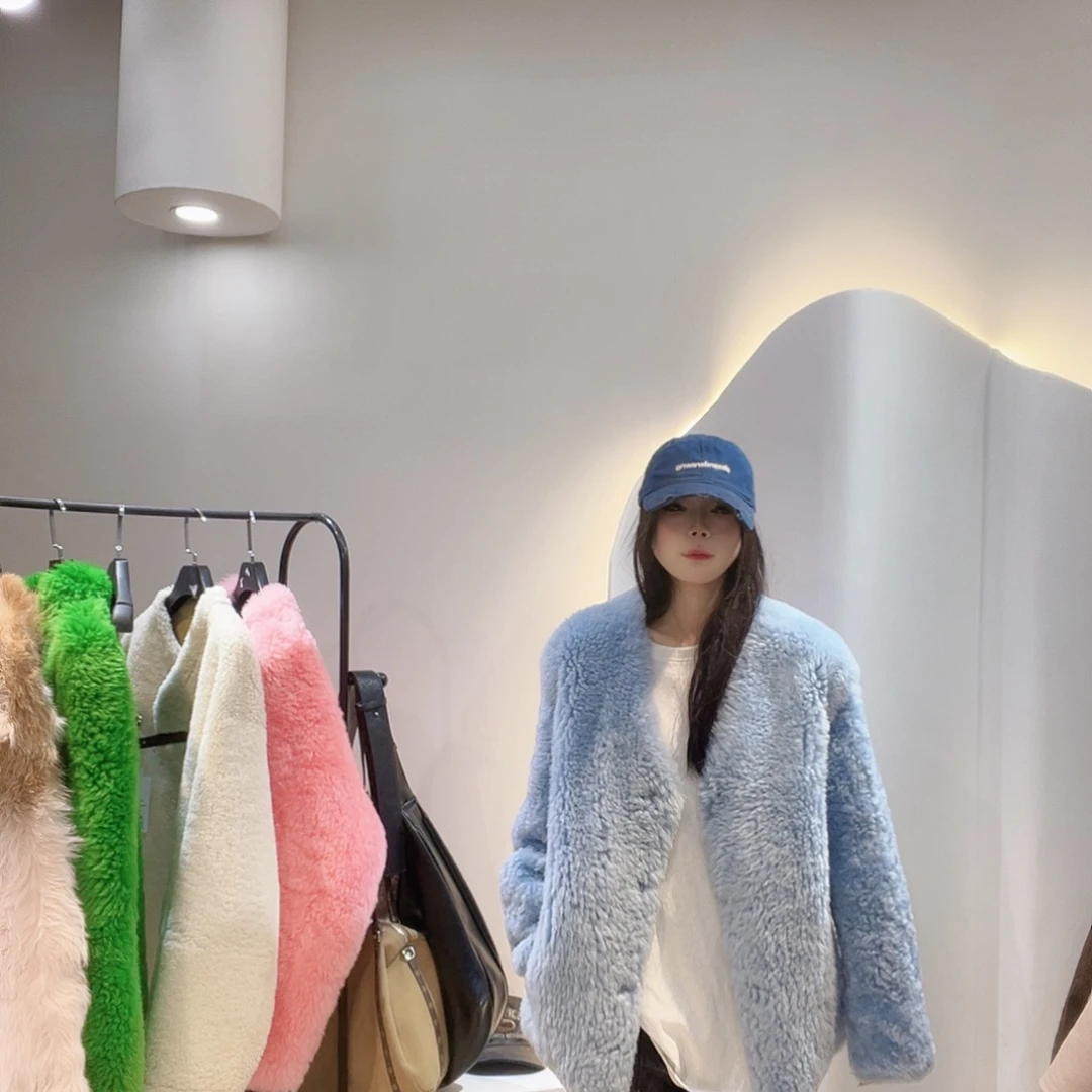 爱***豆真皮皮毛一体外套222-3357蓝