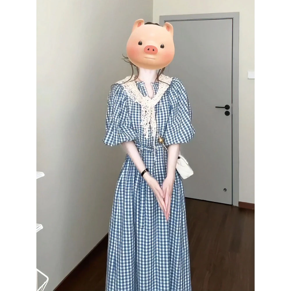 连衣裙女2025夏季新款法式气质泡泡袖百搭收腰显瘦中长款格纹裙子