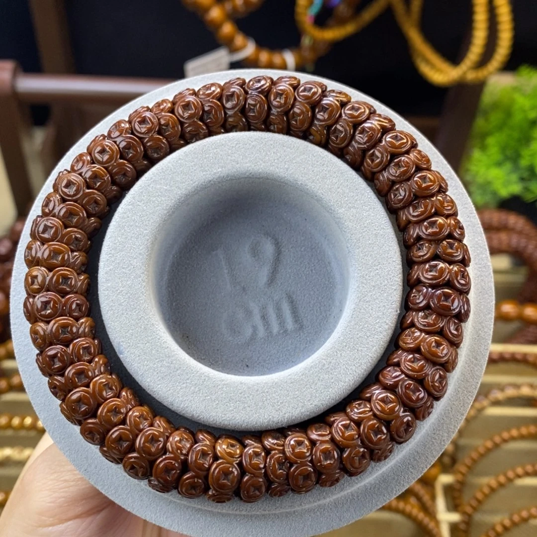 手串紫金鼠雕刻钱币