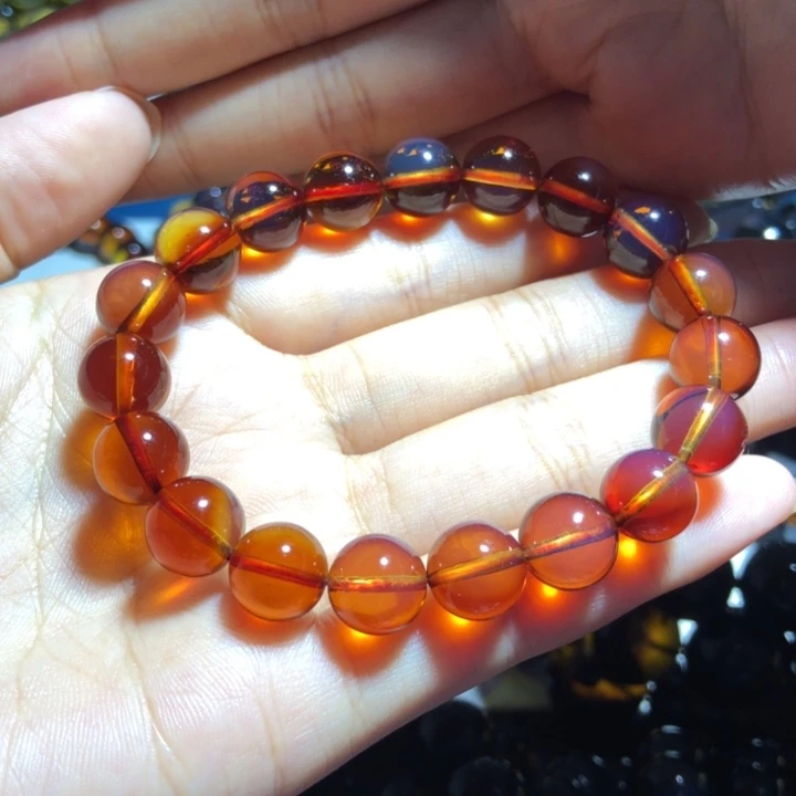 飞***杨未镶嵌琥珀手链收藏级5Ａ净水妖孽火彩红蓝珀