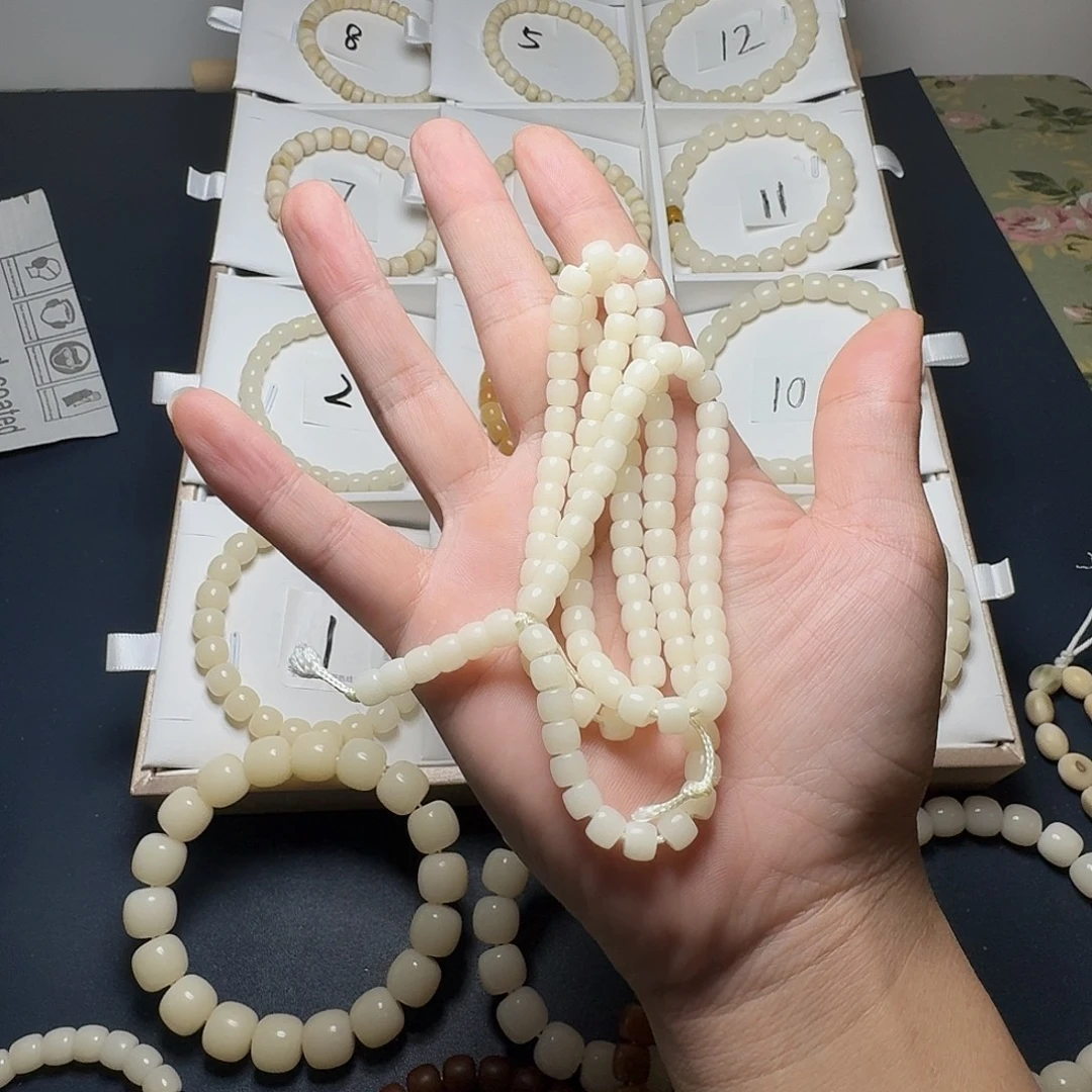****光菩提根/象牙果手串6*5。108