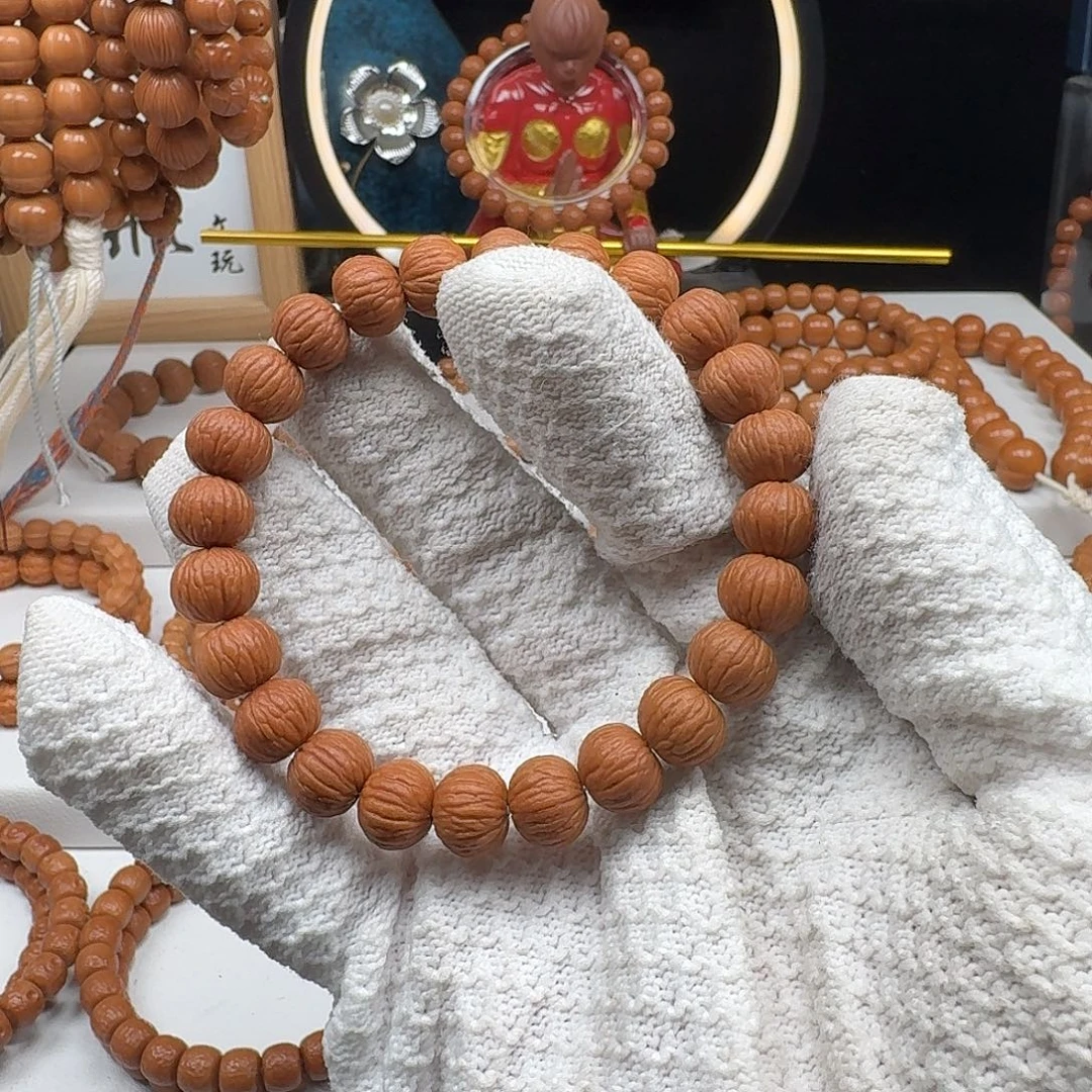 轻****吊坠猴头核桃猴头凤羽11