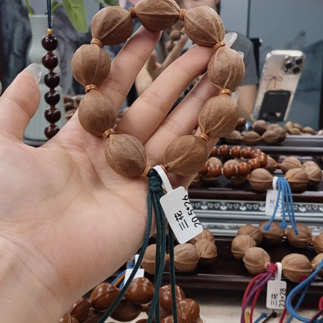 橄榄核吊坠快****。原生态正宗梅林铁核