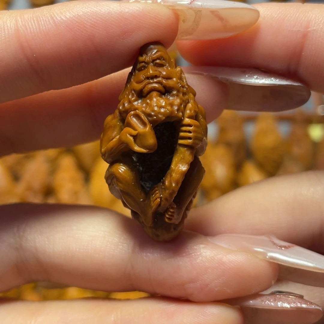 橄榄核手串/手链镂空达摩。瑶