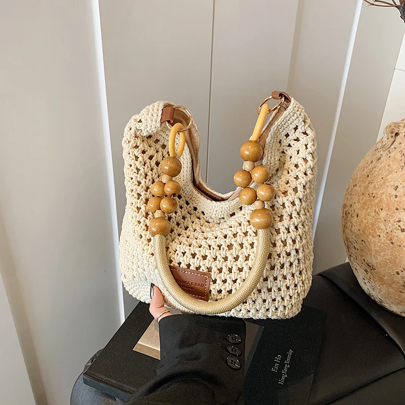 韩版腋下编织包2025冬季海边度假休闲草编包大容量简约百搭单肩包