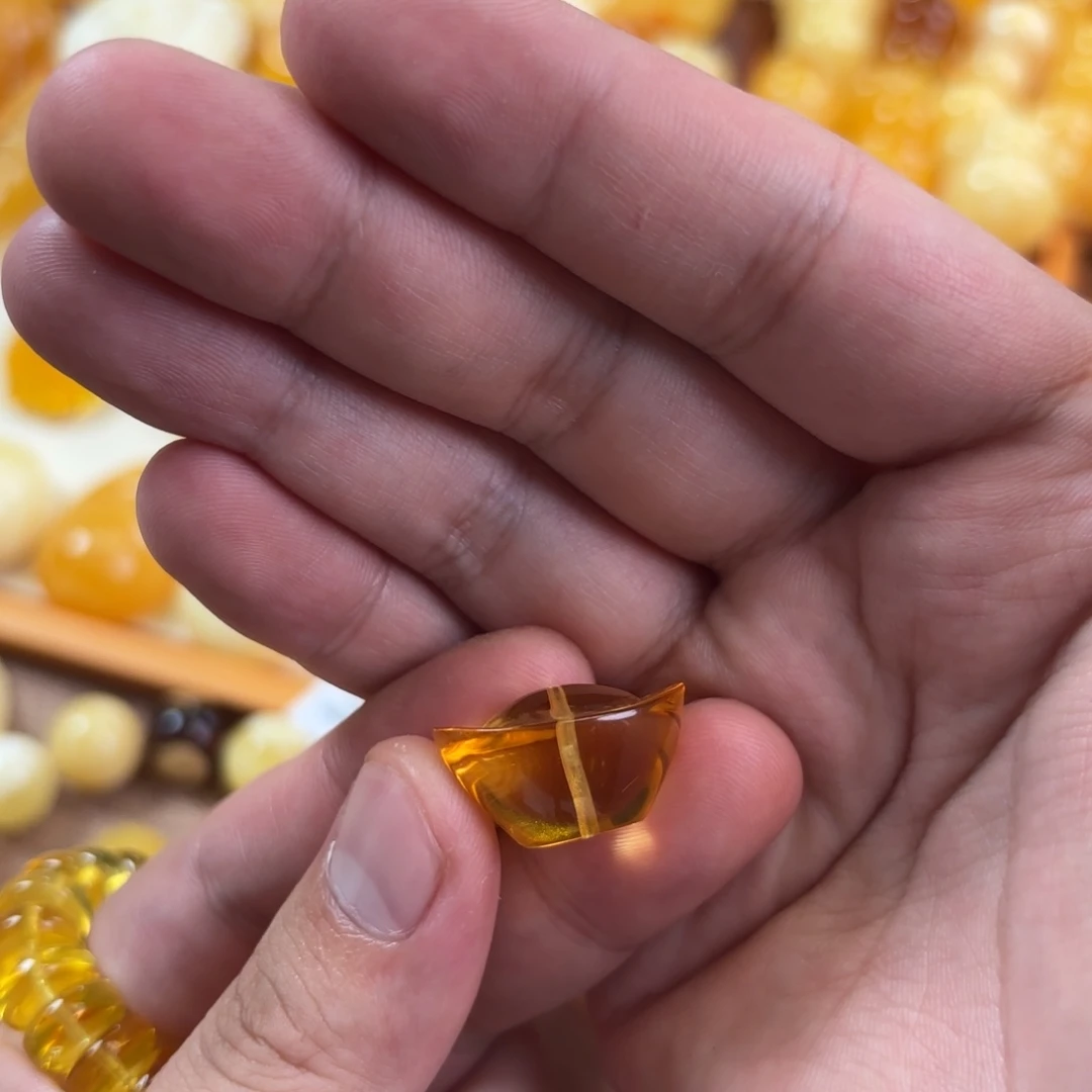 桔****蜜蜡未镶嵌裸石金元宝