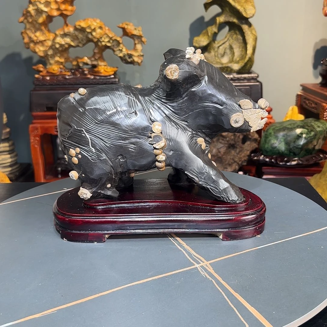 老***童石材黑金刚牛摆件
