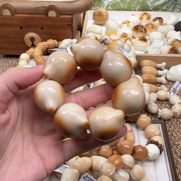 菩提根/象牙果手串10.14.19象牙果炭烤猫头微瑕