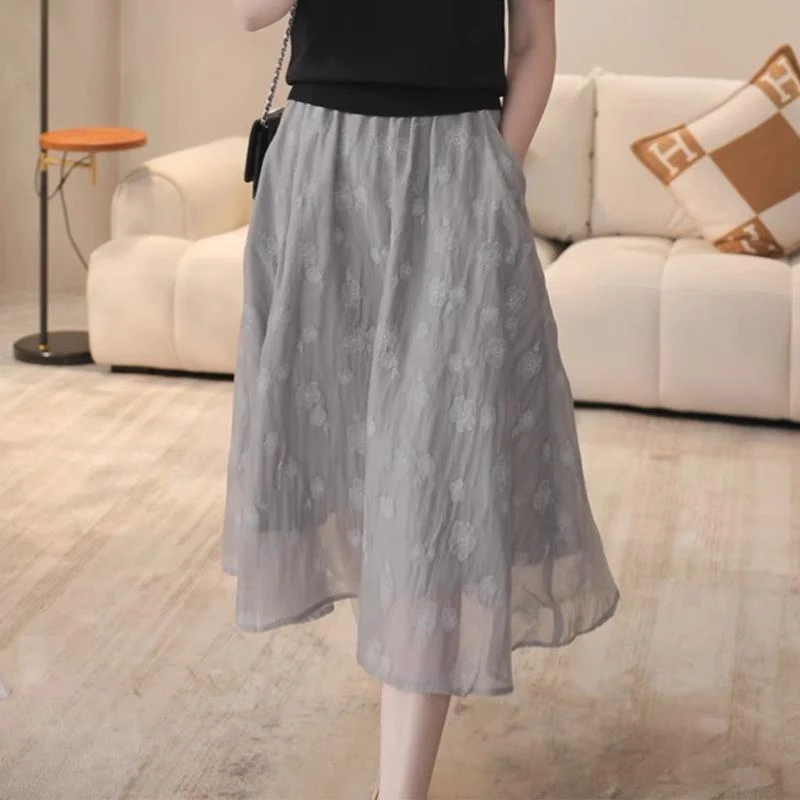 2025年夏季设计感时尚灰色印花半身裙百搭气质洋气减龄A字裙