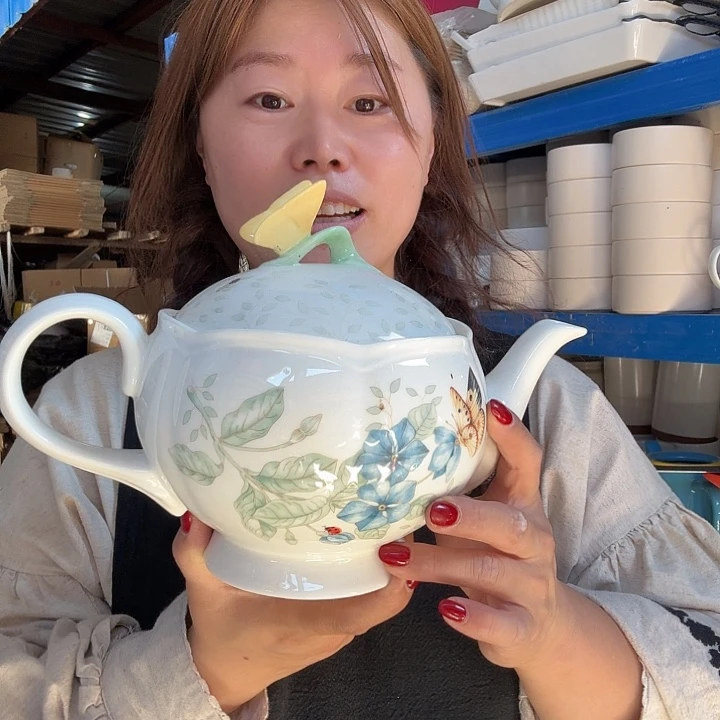 蝴蝶象牙白瓷茶壶微瑕