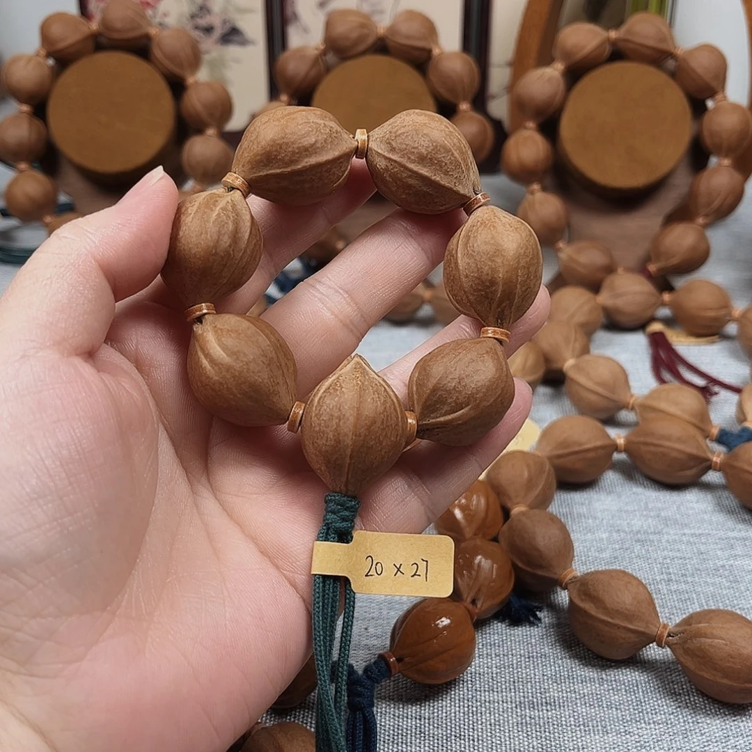 辉***哥手串橄榄核梅林铁核20.27手捻橄榄核