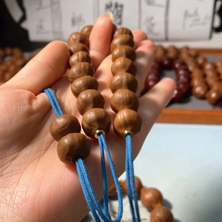 橄榄核手串14*12精品蒜头小铁核14+2颗