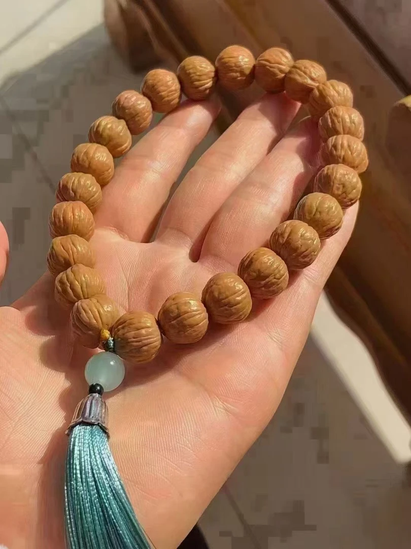 拾伍甄选猴头核桃手持凤羽雕刻原皮原色文玩核桃