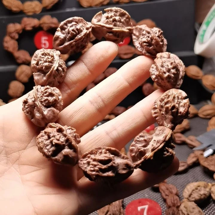 可***雅吊坠文玩核桃东北楸异形籽20