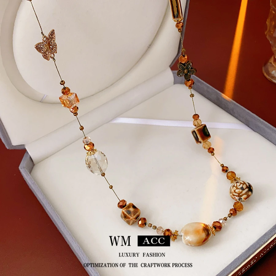 合金陶瓷项链 挂脖陶瓷蝴蝶串珠项链轻奢高级感长款毛衣链波西米