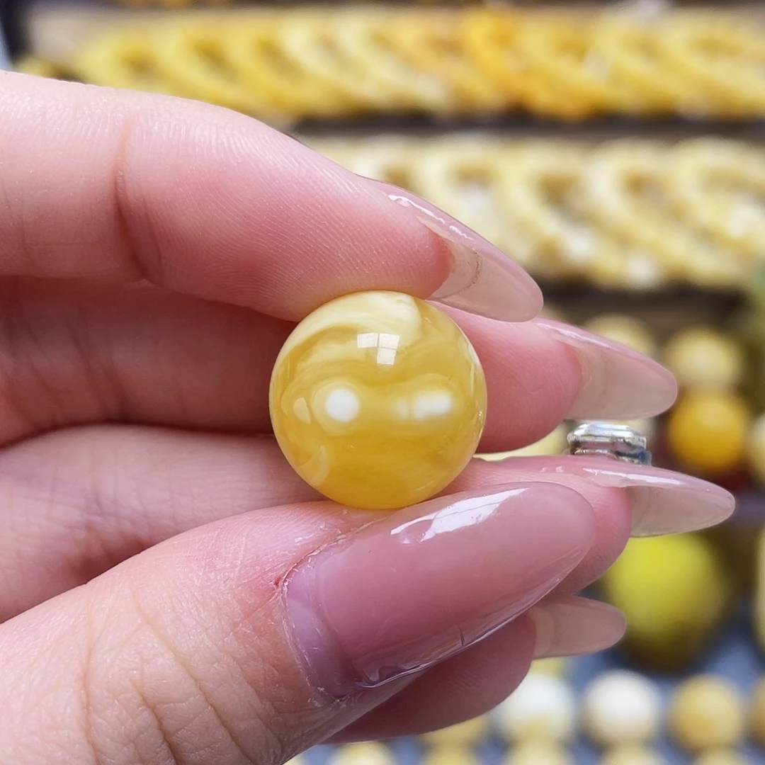 呐***未镶嵌琥珀裸石15.5mm圆珠