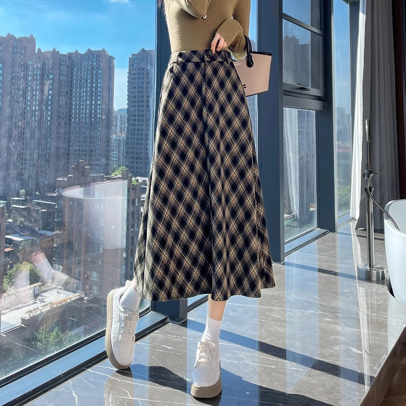 格子半身裙女设计感春秋新款潮流气质小个子宽松垂感显瘦中长裙子