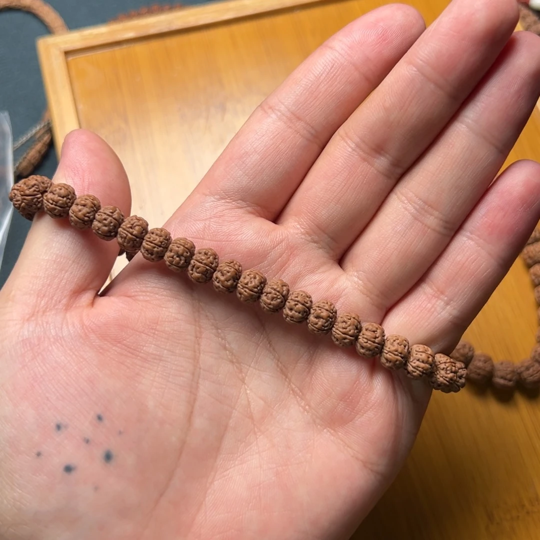 W***i文玩核桃吊坠原生态树王单圈