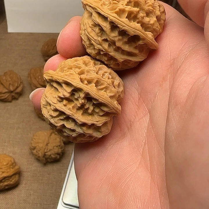 文玩核桃吊坠。好想和小鱼去现场打羽毛球好